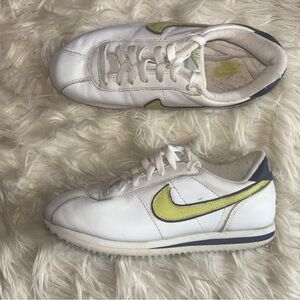 Nike White Leather Sneakers with Yellow Swoosh